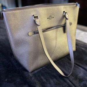 Coach Metallic gold shoulder bag.